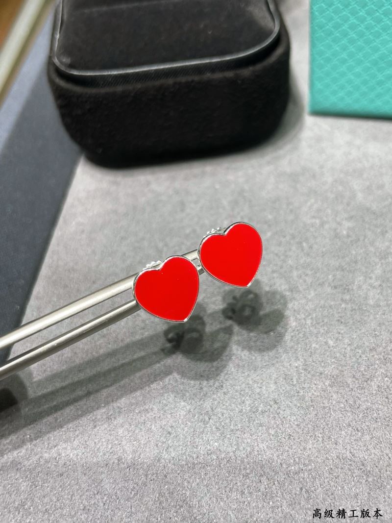 T*f*ny earrings